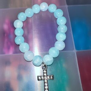 blue bead cross bracelet